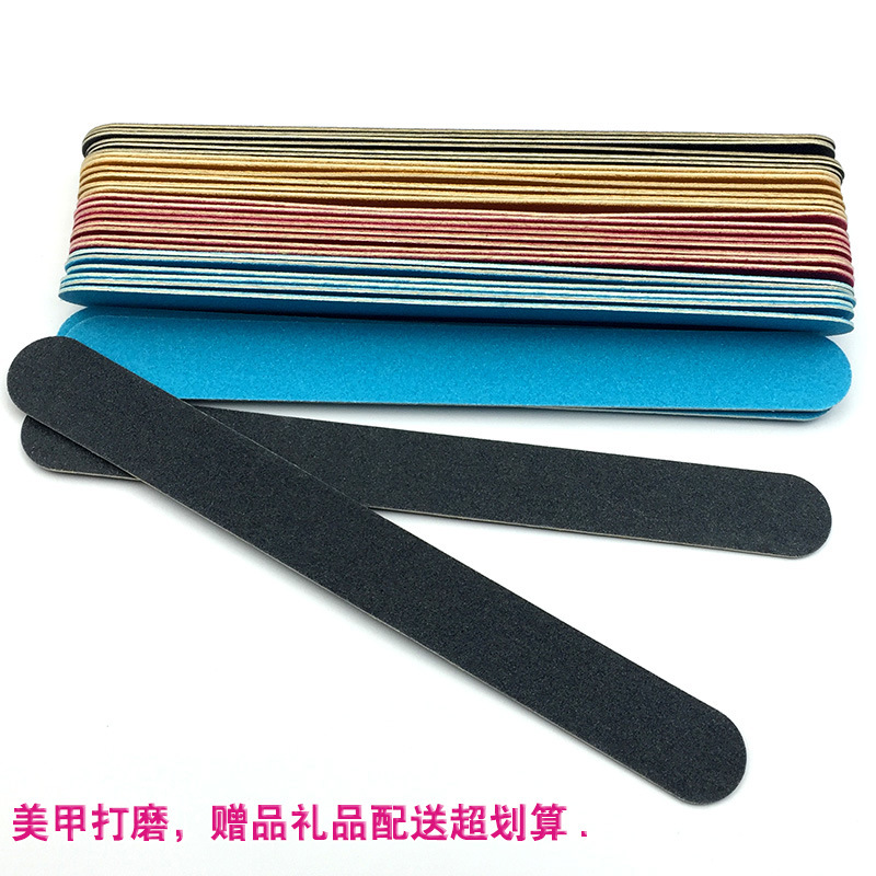 nail file in stock: Thin black sandpaper strips, brown wood chips, nail surface polishing tools, nail files pic 9