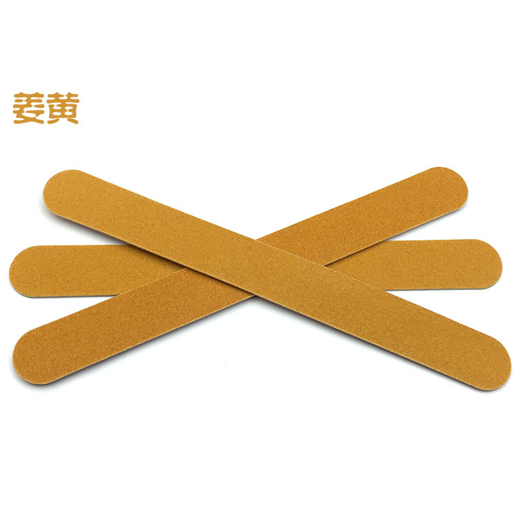 nail file in stock: Thin black sandpaper strips, brown wood chips, nail surface polishing tools, nail files pic 13