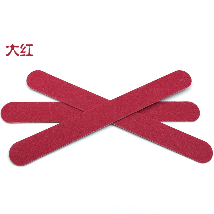 nail file in stock: Thin black sandpaper strips, brown wood chips, nail surface polishing tools, nail files pic 12