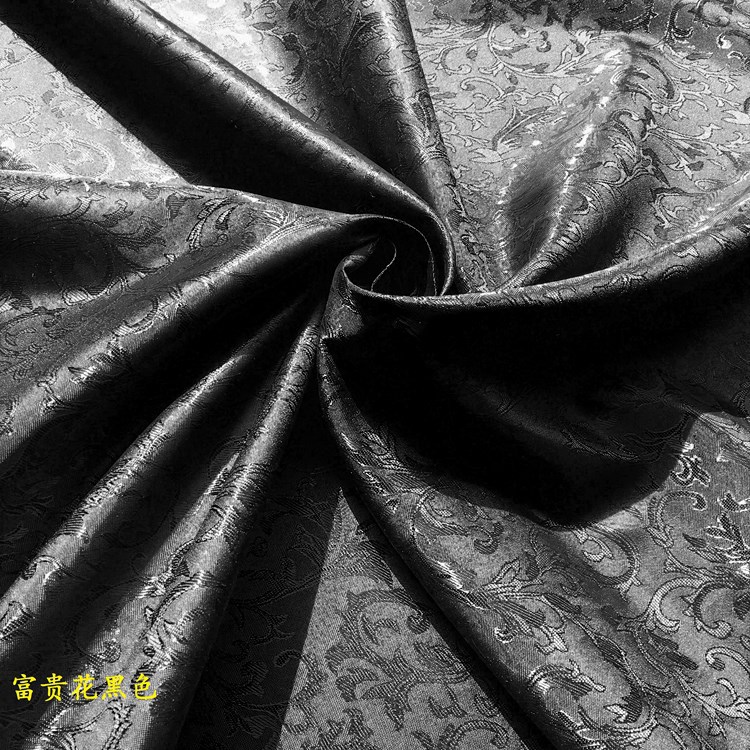 国潮黑底小红花提花布料布匹黑色人丝小草花鞋材服装面料提花布面料详情11