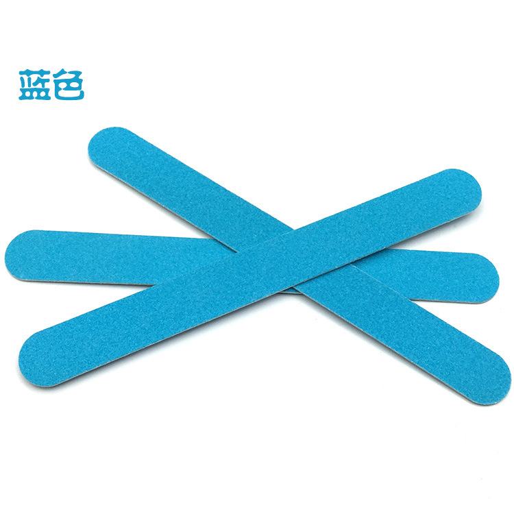 nail file in stock: Thin black sandpaper strips, brown wood chips, nail surface polishing tools, nail files pic 10