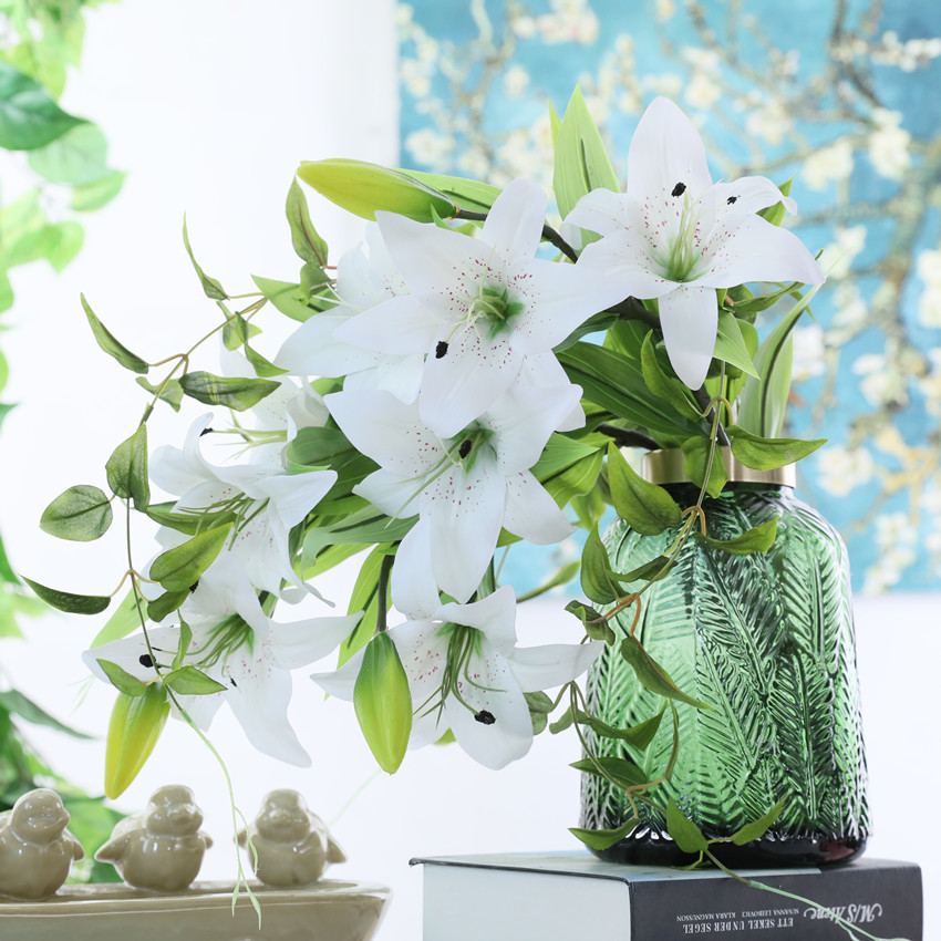 Yiwu wholesale high-fidelity film lilies, 3-head long branches, home, wedding, dining table, hotel decorative flowers, artificial plants, artificial flower arrangements pic 1