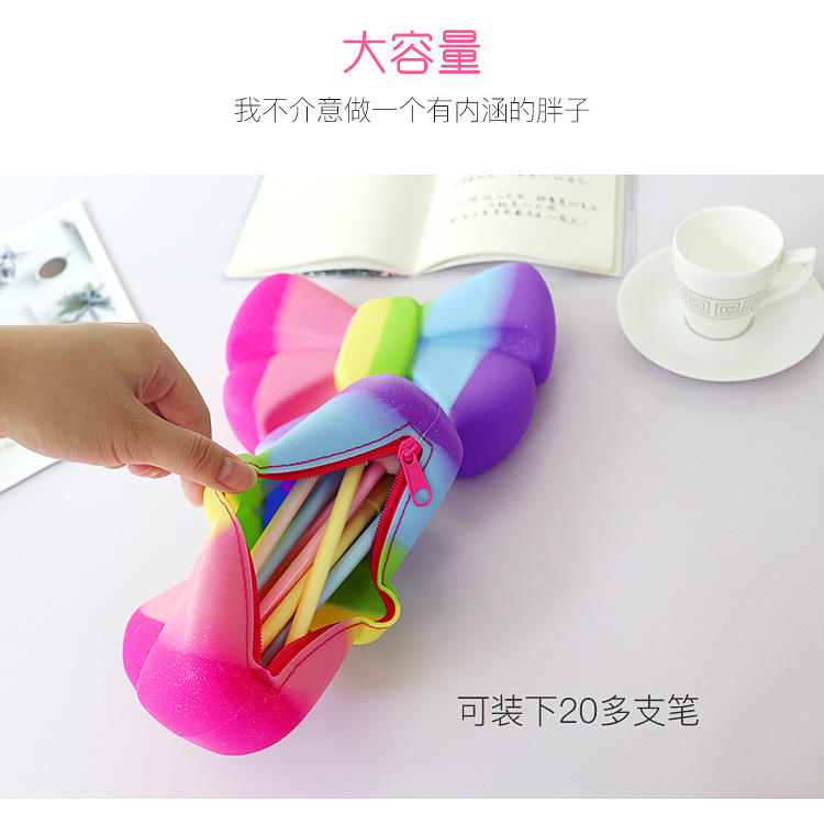 创意可爱彩虹蝴蝶结大容量硅胶笔袋幼儿园学生防水文具盒批发通用塑料详情3