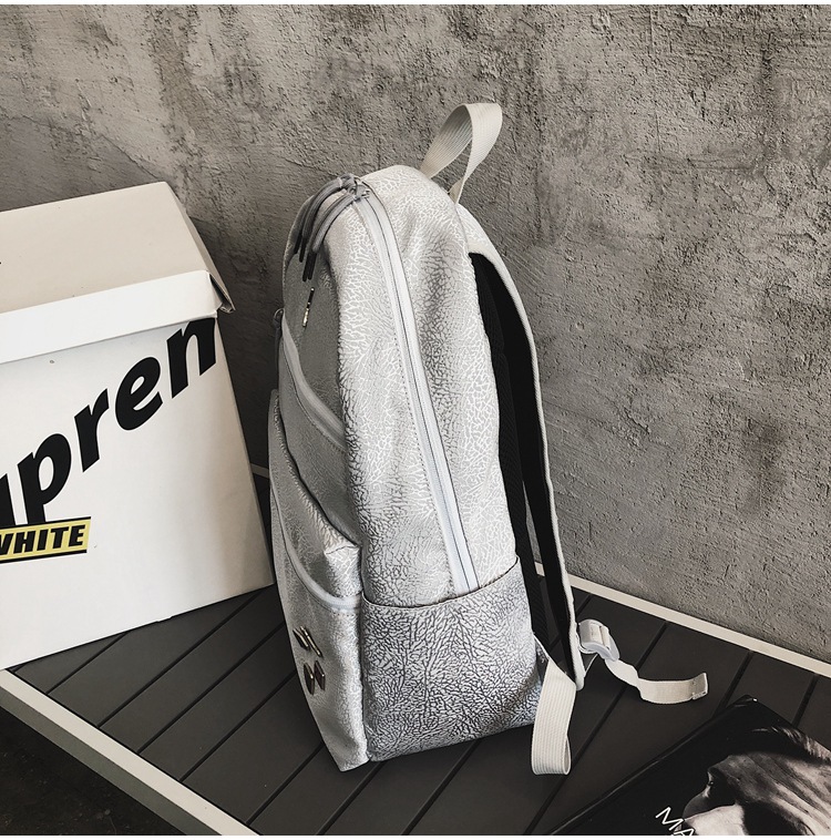 The new sports backpack with cracked white cement for boys and girls is a sporty, casual and fashionable travel backpack that is cool and trendy pic 5