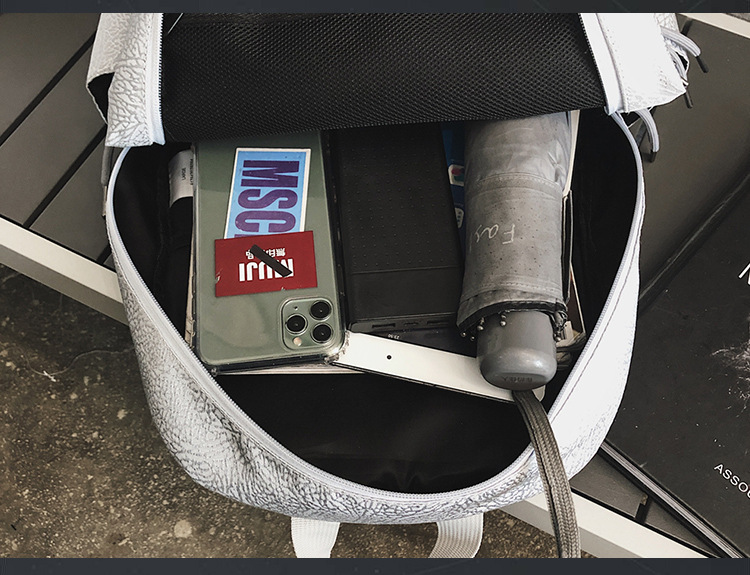 The new sports backpack with cracked white cement for boys and girls is a sporty, casual and fashionable travel backpack that is cool and trendy pic 16