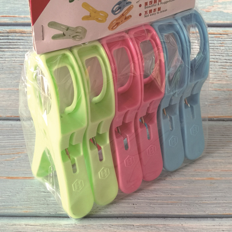 Factory direct sales of universal clothes clips, large plastic drying clips, traceless quilt fasteners, 8-clip windproof drying clothes clips pic 4