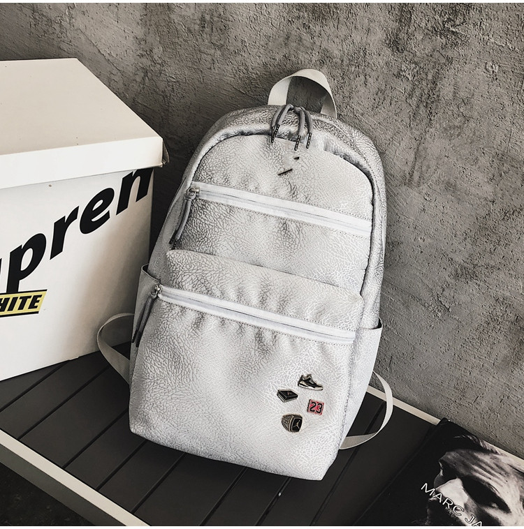 The new sports backpack with cracked white cement for boys and girls is a sporty, casual and fashionable travel backpack that is cool and trendy pic 1
