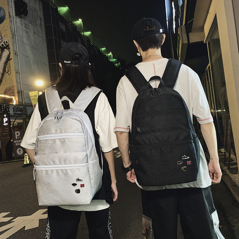 The new sports backpack with cracked white cement for boys and girls is a sporty, casual and fashionable travel backpack that is cool and trendy pic 2
