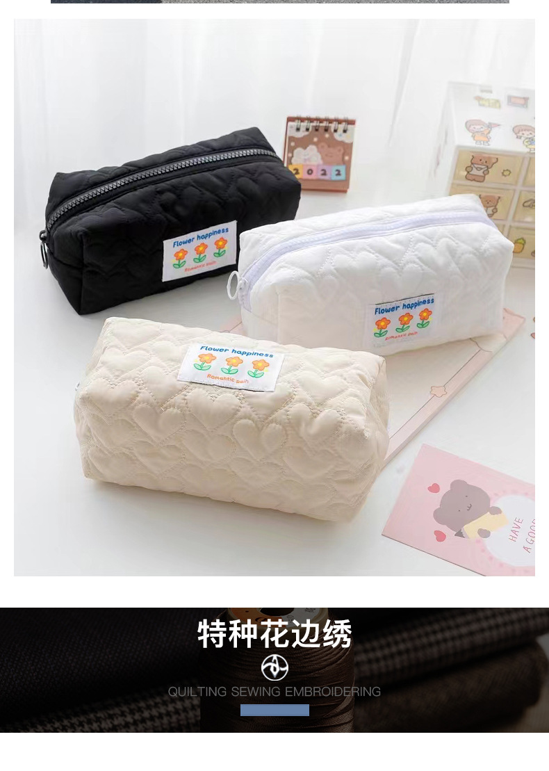 RPET春亚纺绗绣爱心夹棉化妆包文具盒沙发套箱包服装绗缝面料详情6