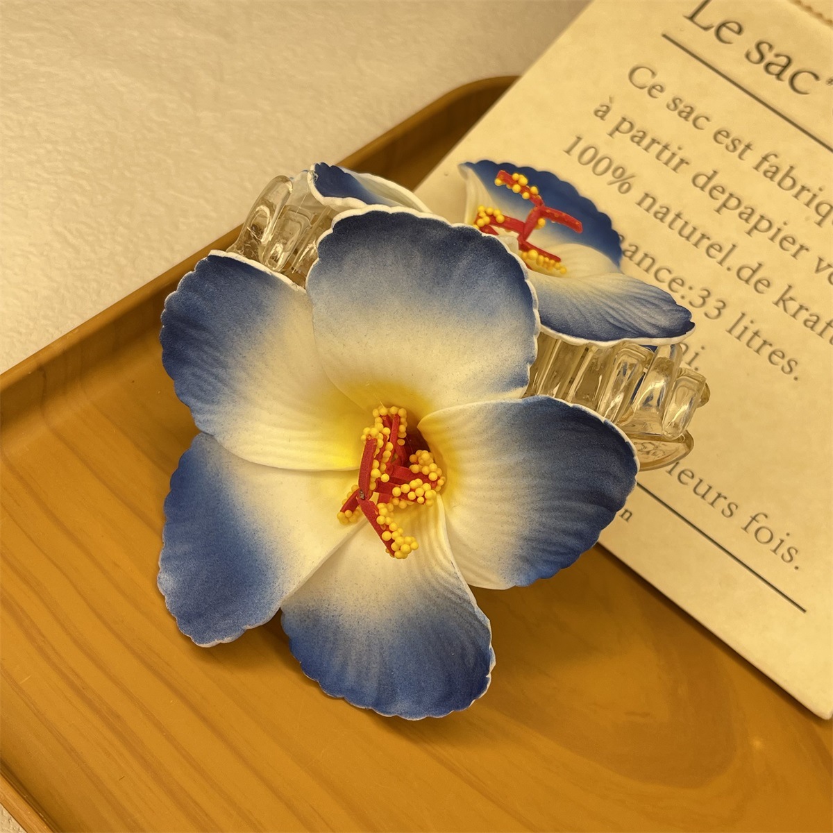 This trendy faux hibiscus flower hair clip exudes a high-end atmosphere. The side clip is a Bohemian hair band for a seaside vacation pic 38