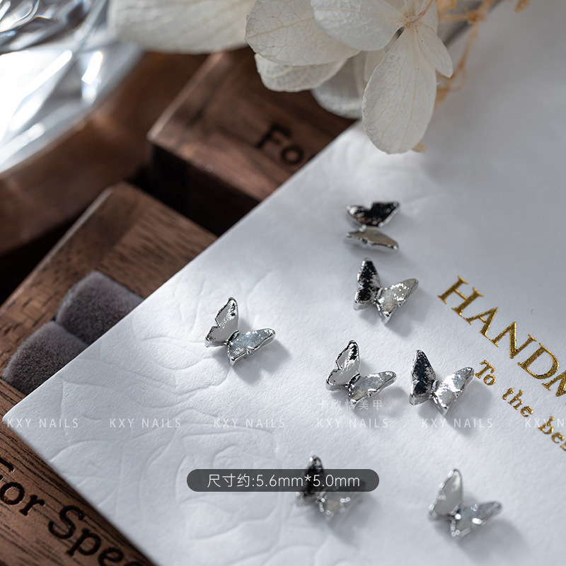 The alloy butterfly bow tie series of nail art accessories is a popular three-dimensional bestseller. It is a high-end and light luxury nail accessory with a butterfly diamond pattern pic 4