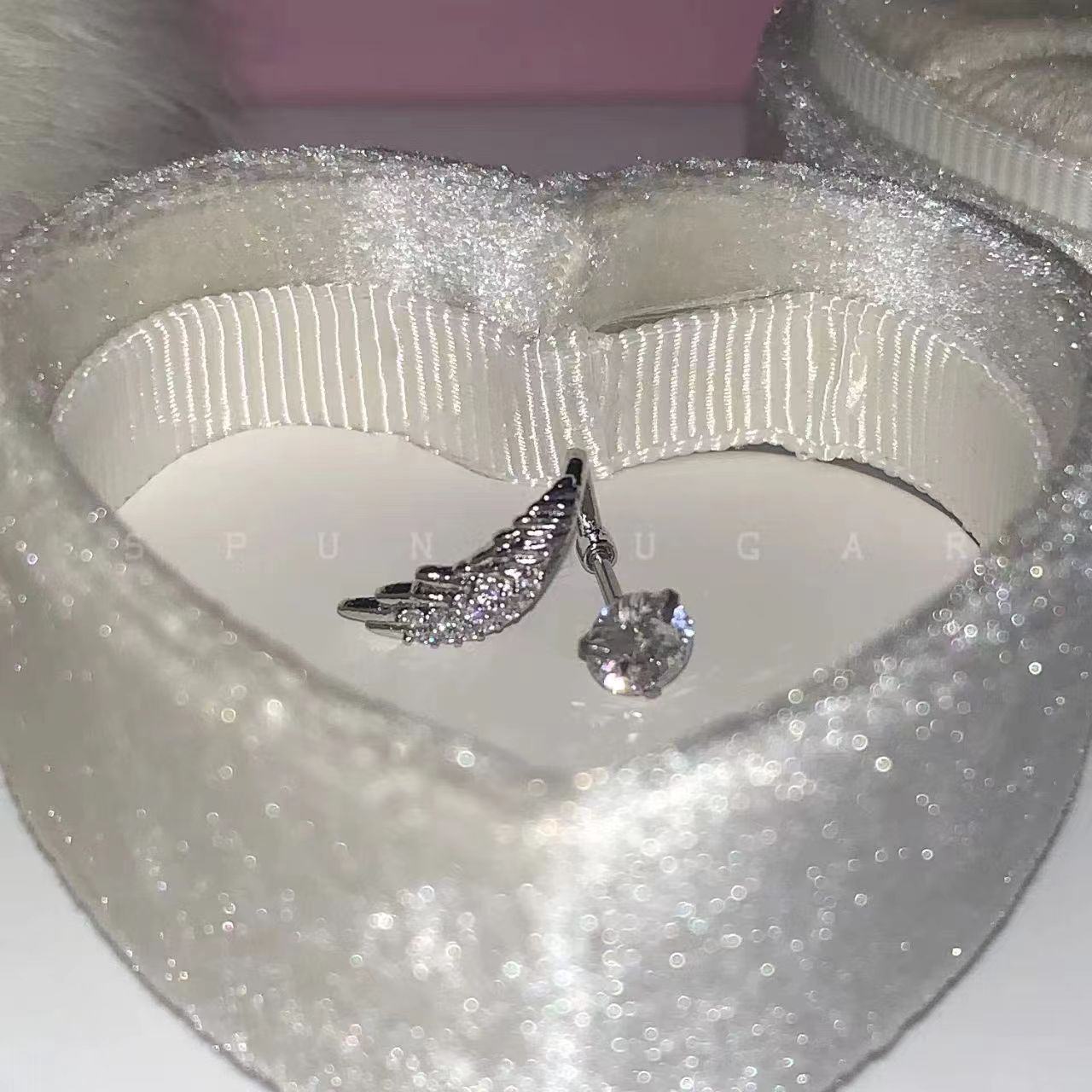 Stunning angel wing ear bone stud titanium steel versatile, unique and niche angel wing entwined sparkling diamond ear stud earrings for women pic 4