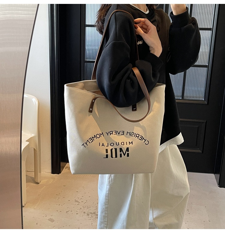 Large-capacity 2025 new style simple single-shoulder hand-carry cloth bag, college student class tote bag, versatile canvas bag for women pic 39