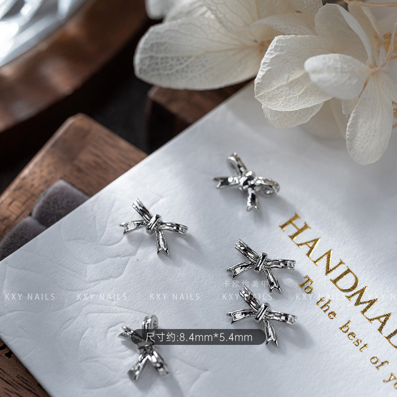 The alloy butterfly bow tie series of nail art accessories is a popular three-dimensional bestseller. It is a high-end and light luxury nail accessory with a butterfly diamond pattern pic 8