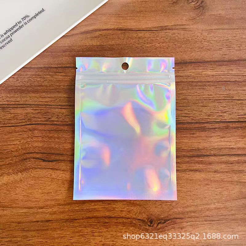 Yiwu Laser Phantom Color self-standing and Self-sealing bags, Yin-Yang aluminum foil bags, mobile phone cases, beauty and accessory packaging bags wholesale pic 11