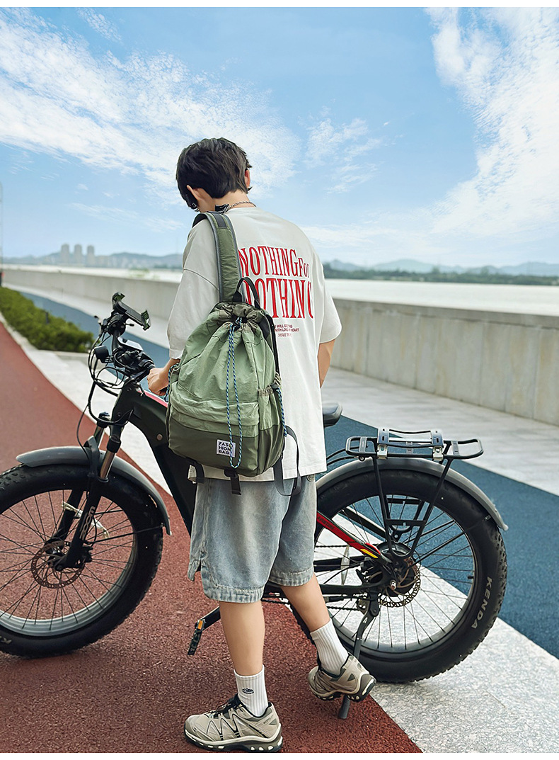 新款束口抽绳双肩包大容量休闲包户外运动登山包超轻量旅行背包详情25