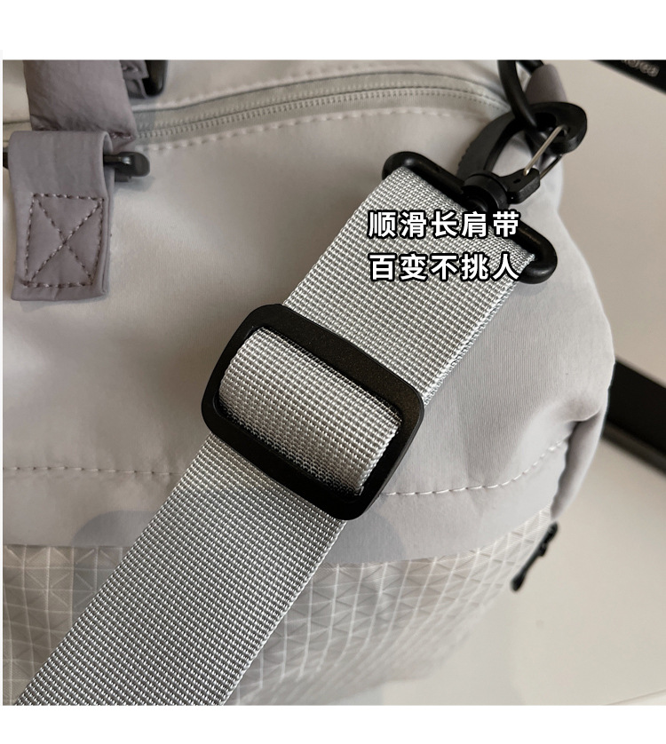 短途旅行包女轻便多功能斜挎运动健身包手提出差大容量收纳行李袋详情10