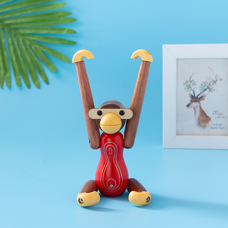创意卡通木质摆件懒人桌面手机支架倒挂猴北欧风装饰品摆件批发详情10