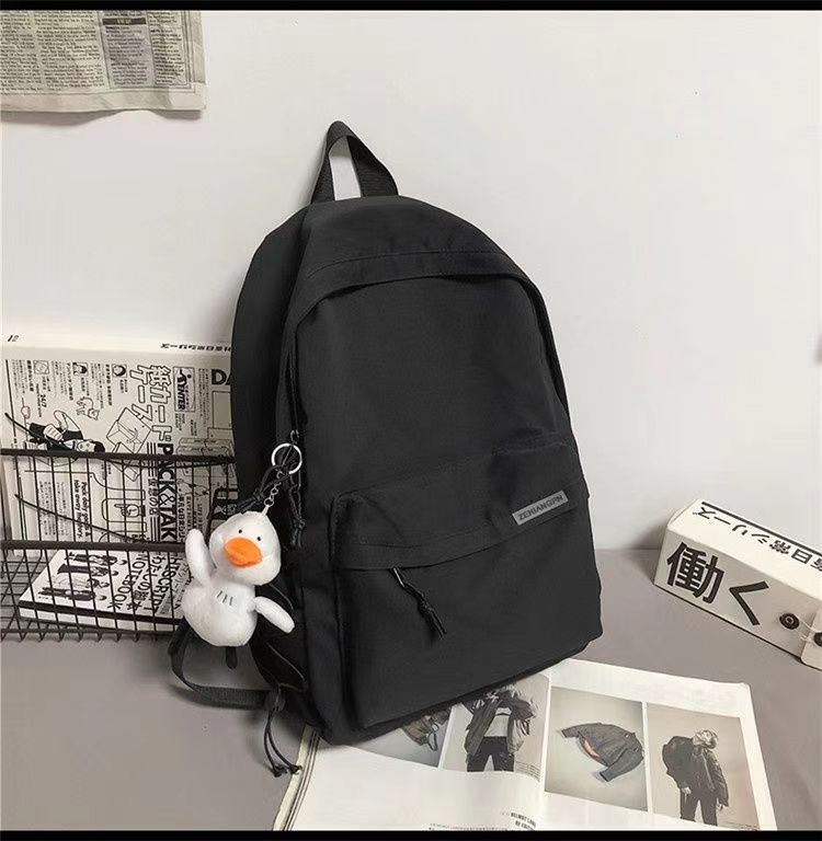 日系初高中学生上课书包男新款洋气质感纯色简约休闲女生双肩背包详情14