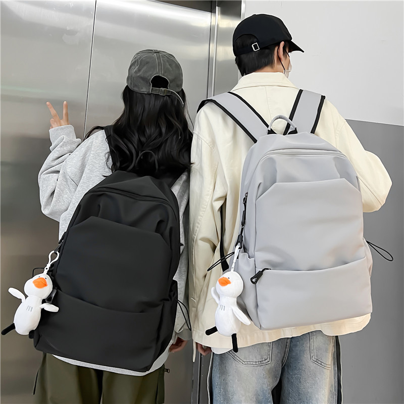 韩系大容量纯色双肩包女韩版简约百搭书包男初中背包女双肩大学生详情5