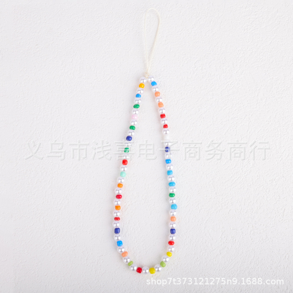 New colored rice bead mobile phone chain from ins in Europe and America, pearl smiling face beaded heart-shaped mobile phone accessory pendant for women pic 4