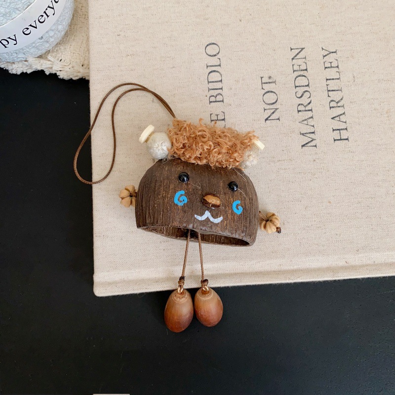 The natural cartoon pendant with the shell of the water bell tree, a soothing sound therapy seed, is a popular and cute pendant accessory in the scenic area pic 2
