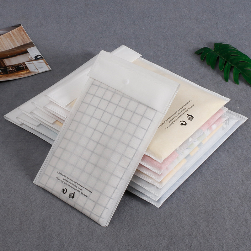 现货服装包装袋加厚无纺布衣服按扣收纳袋暗扣密封女装包装信封袋详情17