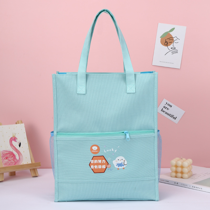 Factory direct supply of cartoon hand-held book bags for primary school students, lightweight and reducing burden. Carefully selected bags for after-school training and remedial classes. Practical and durable school bags for primary school students pic 6