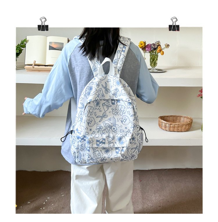 双肩包女时尚简约印花初高中大学生书包韩版潮流涂鸦休闲双肩背包详情19