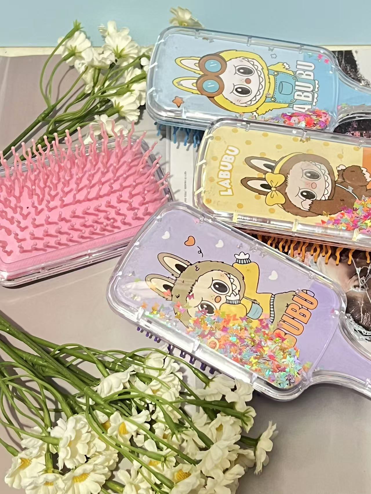 史迪仔儿童美发梳可爱卡通KT猫三丽欧气垫流沙梳气囊梳可挑款详情10