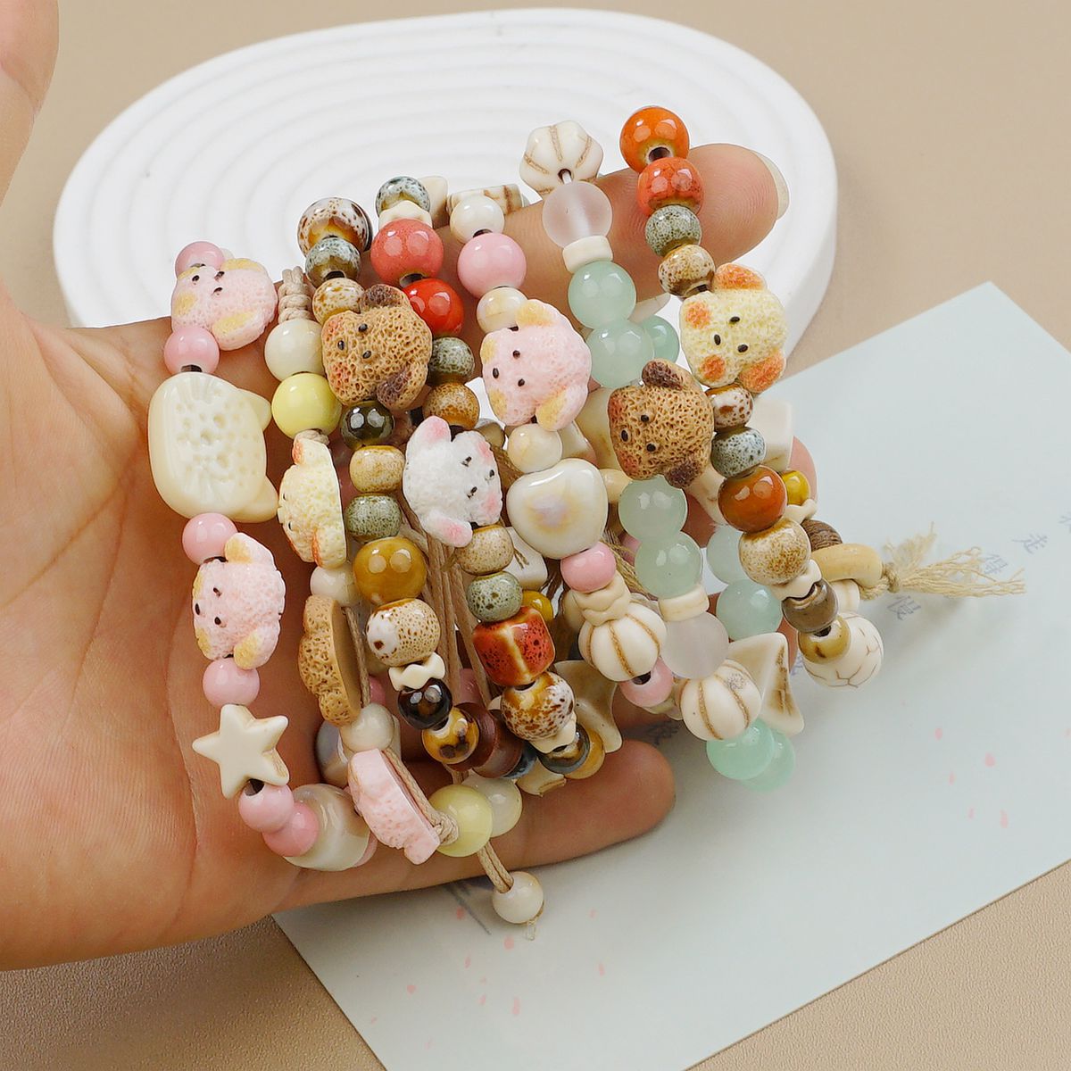 Jingdezhen ceramic bracelets, cartoon with texture, Teddy dog handcrafted ornaments, bracelets, student gifts, and street vending accessories pic 2