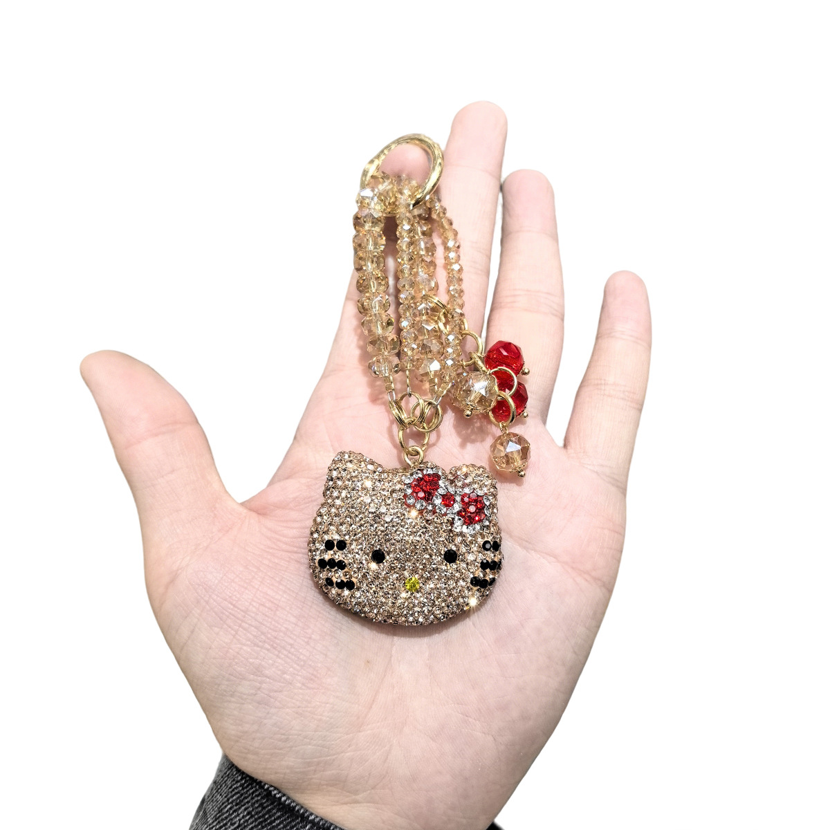 Cross-border light luxury full-diamond cartoon cat diamond rope pendant, creative car keychain, cute couple bow bag pendant pic 3
