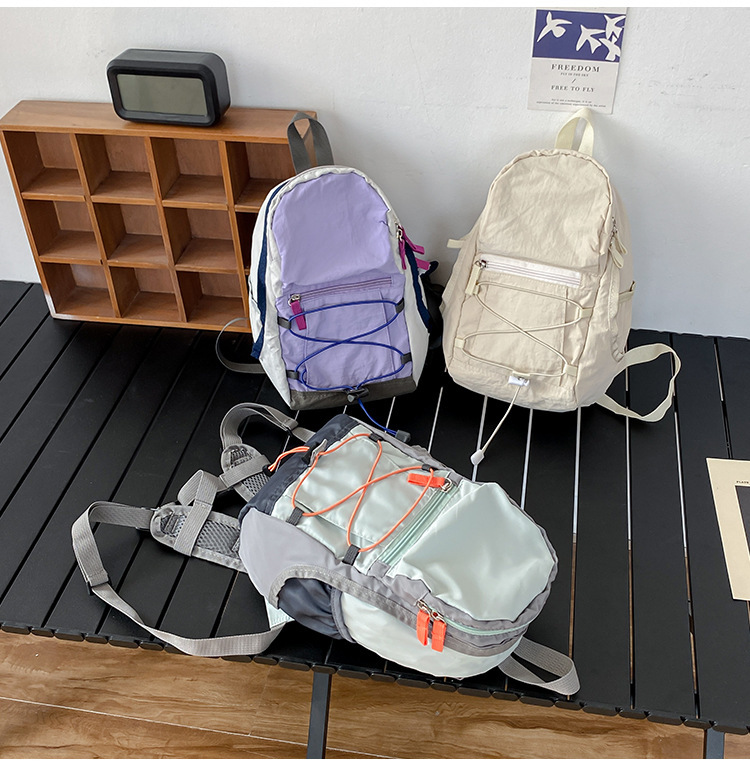户外双肩包抽绳迷你休闲包轻便百搭旅行登山包女轻便旅游小背包详情40