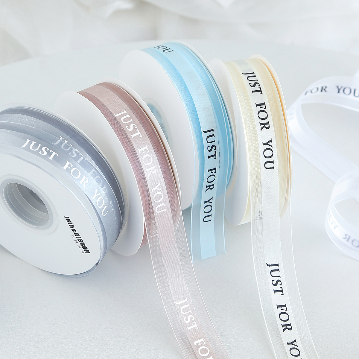 Factory direct sales: 2.5cm medium satin edge gauze English ribbon High-quality snow gauze ribbon flower packaging ribbon gift cake pic 20