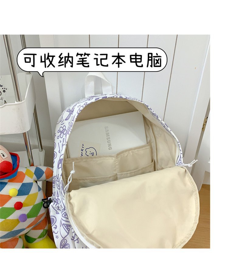 双肩包女时尚简约印花初高中大学生书包韩版潮流涂鸦休闲双肩背包详情8