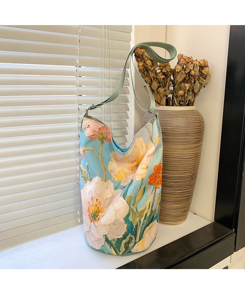 大容量国风印花水桶包女创意花卉个性手提单肩包设计感休闲斜挎包详情15
