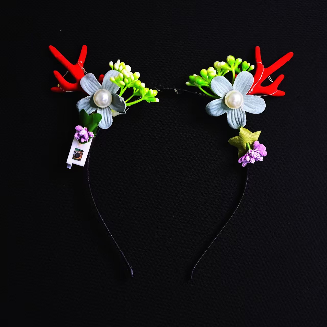 Christmas glowing headwear has become a hit, with the branch antler headband and the elk headband selling well at the winter night market pic 3