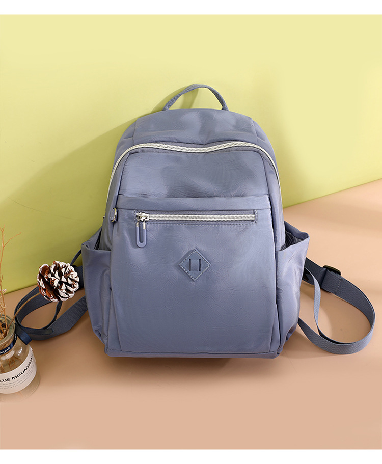 大容量双肩包女士时尚潮流韩版背包防泼水出行旅行包情侣韩版书包详情18