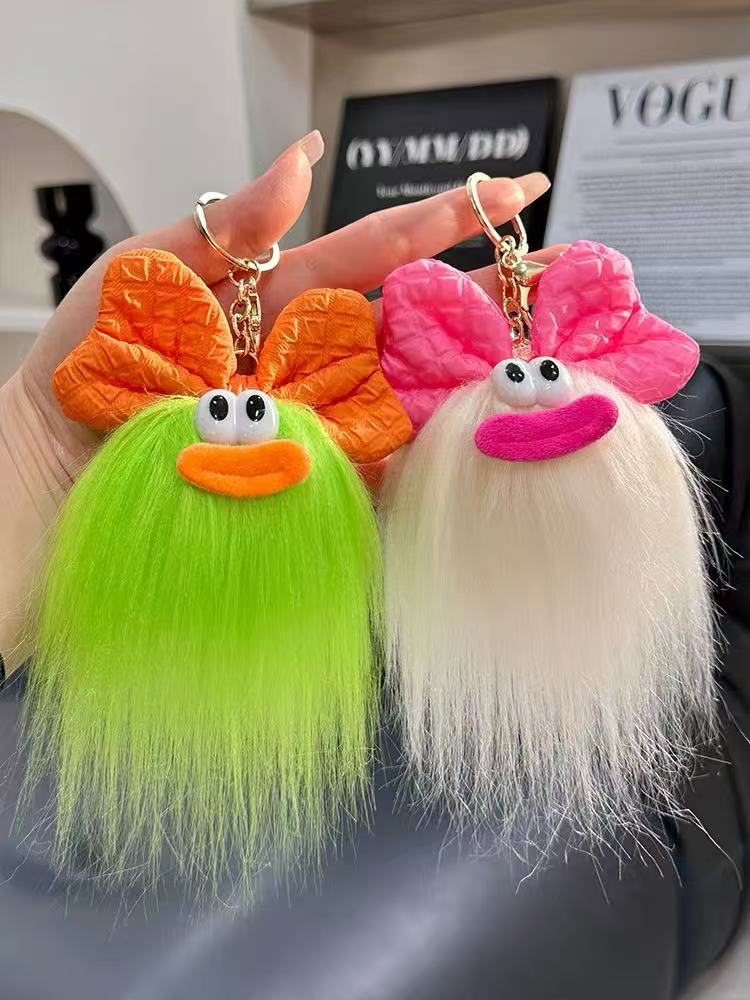 可爱蝴蝶结怪兽娃娃钥匙扣卡通搞怪毛绒书包挂件丑萌玩偶挂饰礼品详情4
