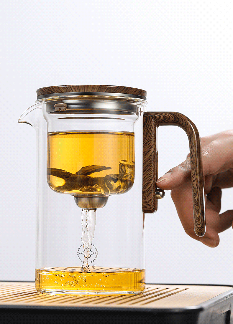 The rodless magnetic suction drifting cup with a glass inner liner for brewing tea and water separation and one-click filtration is a household tea set available for wholesale in stock pic 3