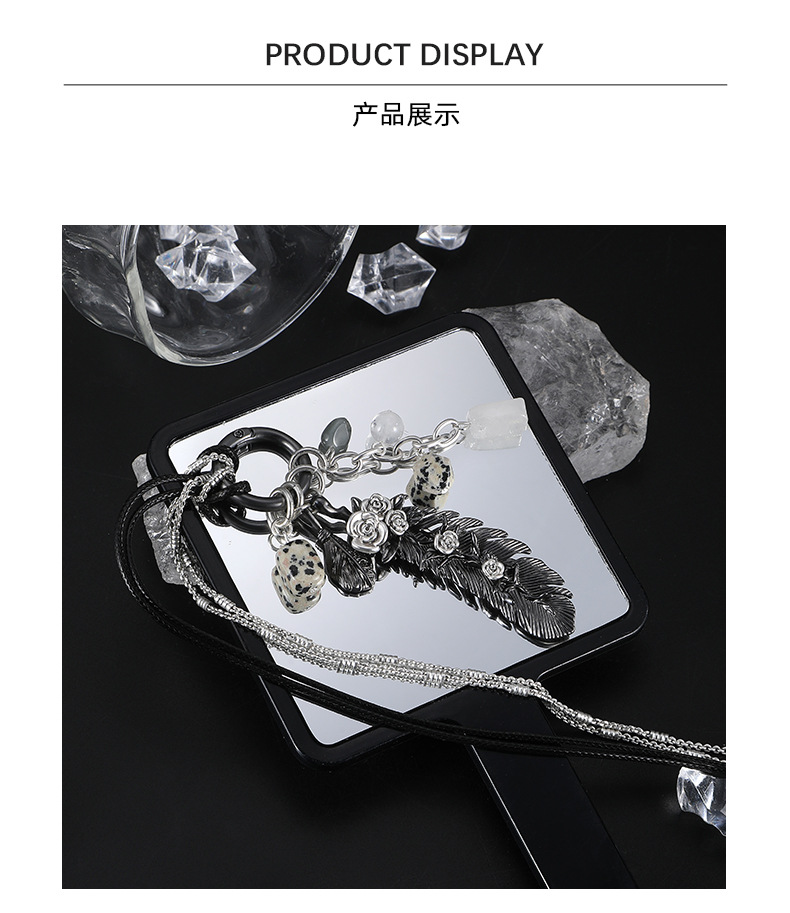 The Dark Feather necklace is a long, original design for women with a versatile commuting style. It is a light luxury, niche, and unique sweet and cool sweater chain pic 9