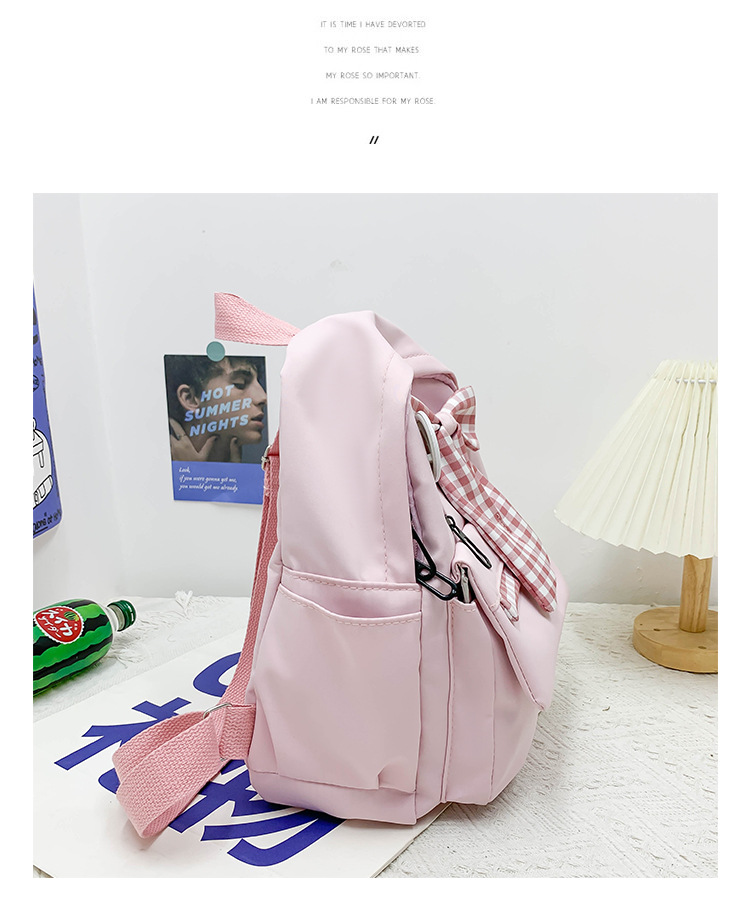 蝴蝶结书包女小学生大容量三到六年级初中轻便减负可爱简约双肩包详情20