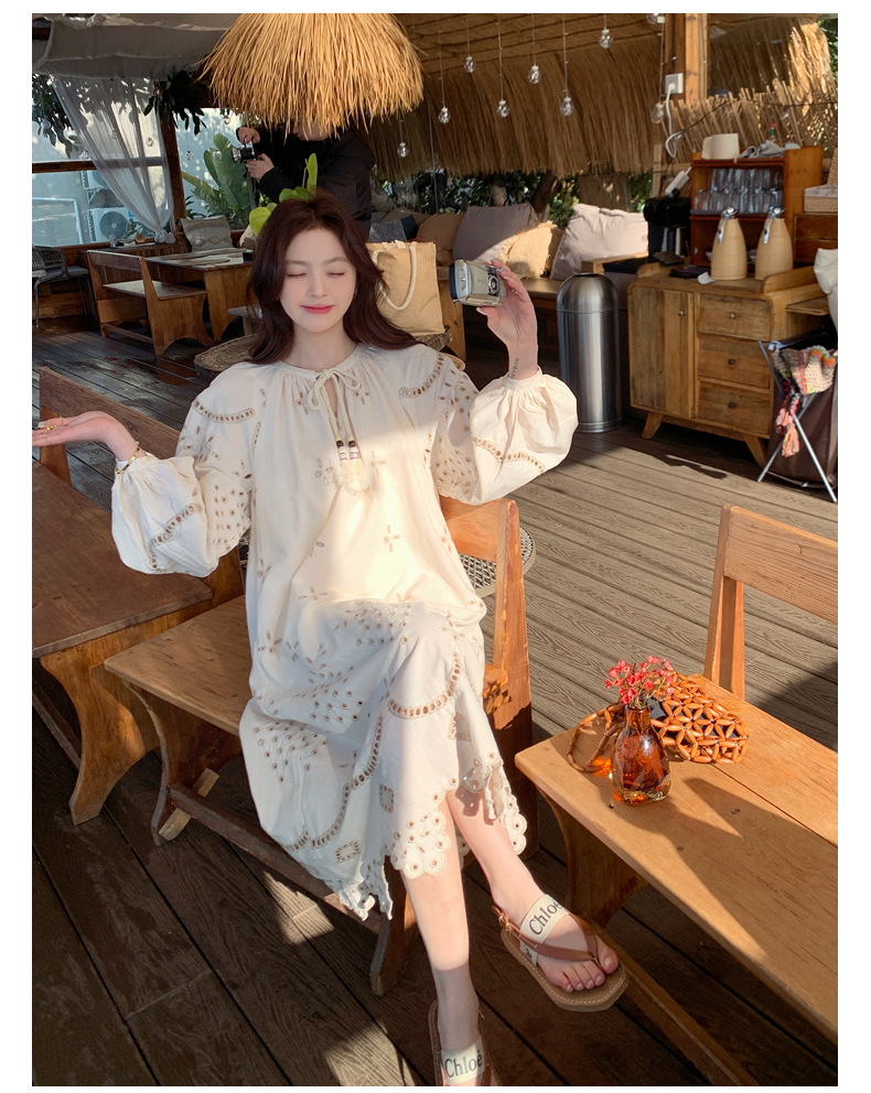 Real photo of a retro, gentle, cut-out embroidered V-neck apricot-colored dress, 2025 new seaside vacation style long-sleeved umbrella dress pic 18