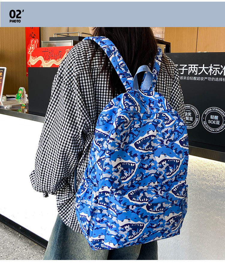 2024新款超轻大容量时尚潮流双肩包男简约电脑包背包中小学生书包详情3