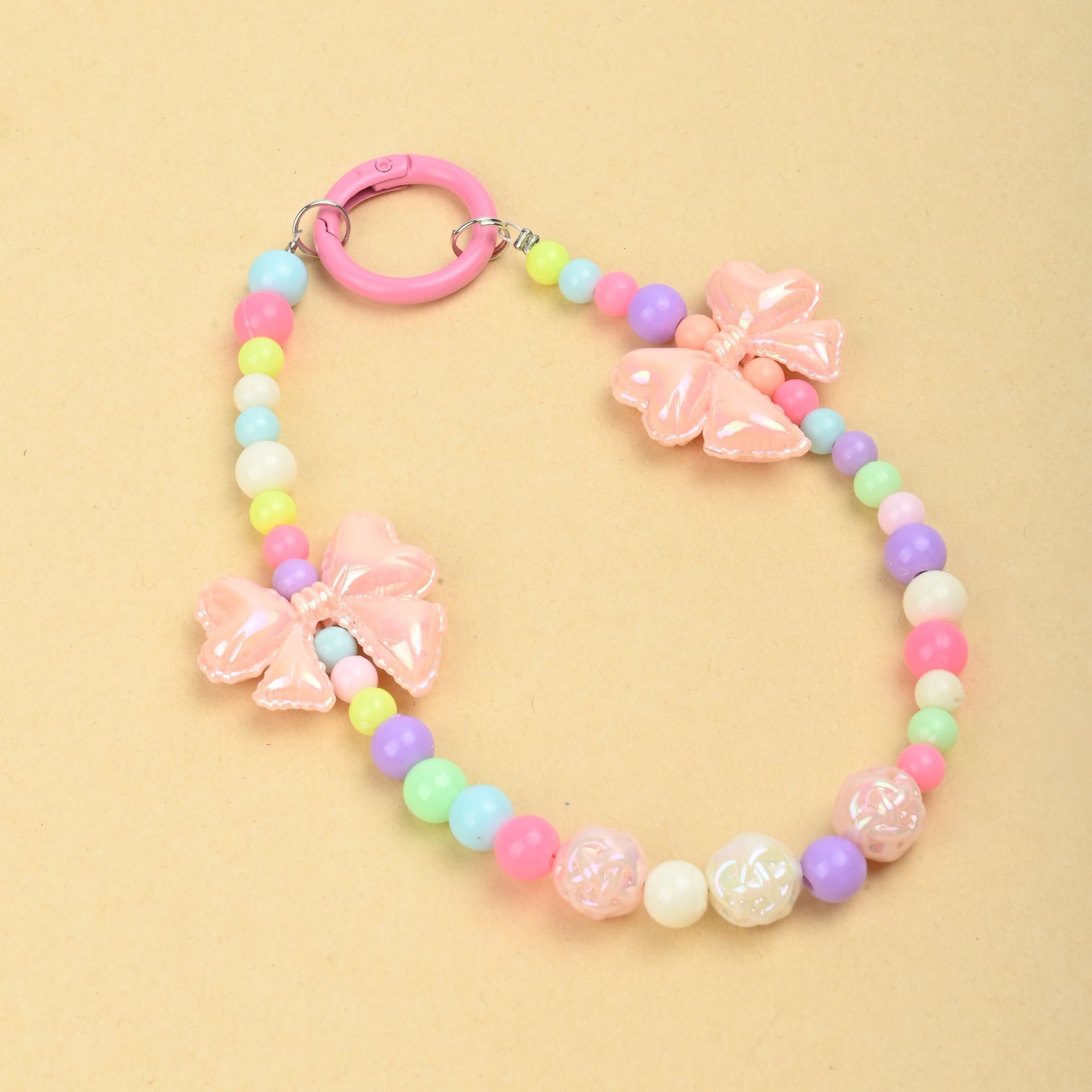 Wholesale of new colored candy-colored mobile phone chains, bows, beads, bag chains, water cup chains, car keychains and pendants pic 4