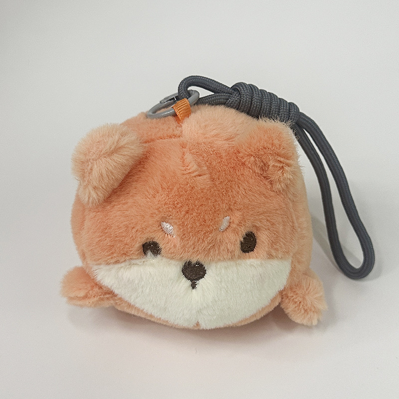 The little cat doll that wags its tail by pulling a rope is called the popular little white rabbit plush toy backpack doll at the street stall pic 17