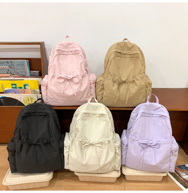 新款时尚轻便简约双肩包女日系文艺学生书包休闲运动旅行纯色背包详情31