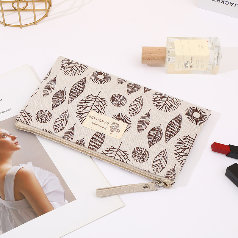 跨境现货布艺化妆包拉链袋多功能便携式收纳手拿洗漱包学生笔袋详情23