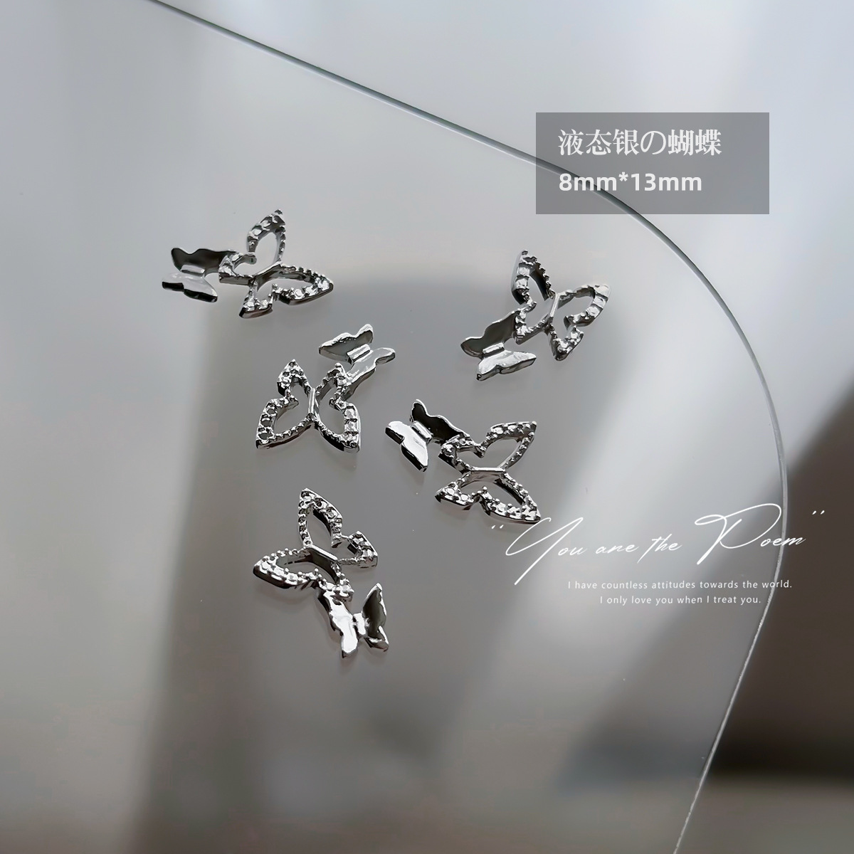 Wholesale of y2k liquid silver alloy butterfly wing hollowed-out mini bow tie nail accessories pic 6
