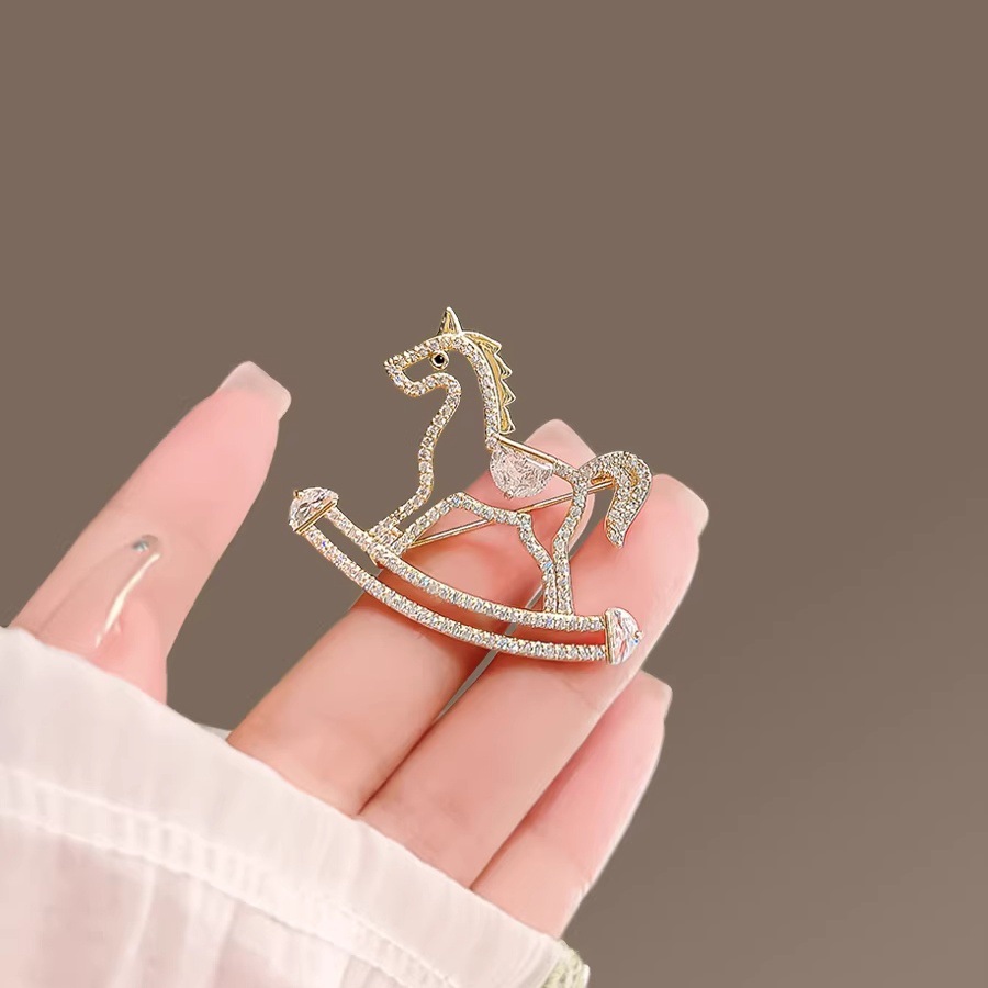 Exquisite hollowed-out wooden horse brooches for both men and women, cute and unique niche pins, summer anti-exposure clasp, and elegant corsage accessories pic 8